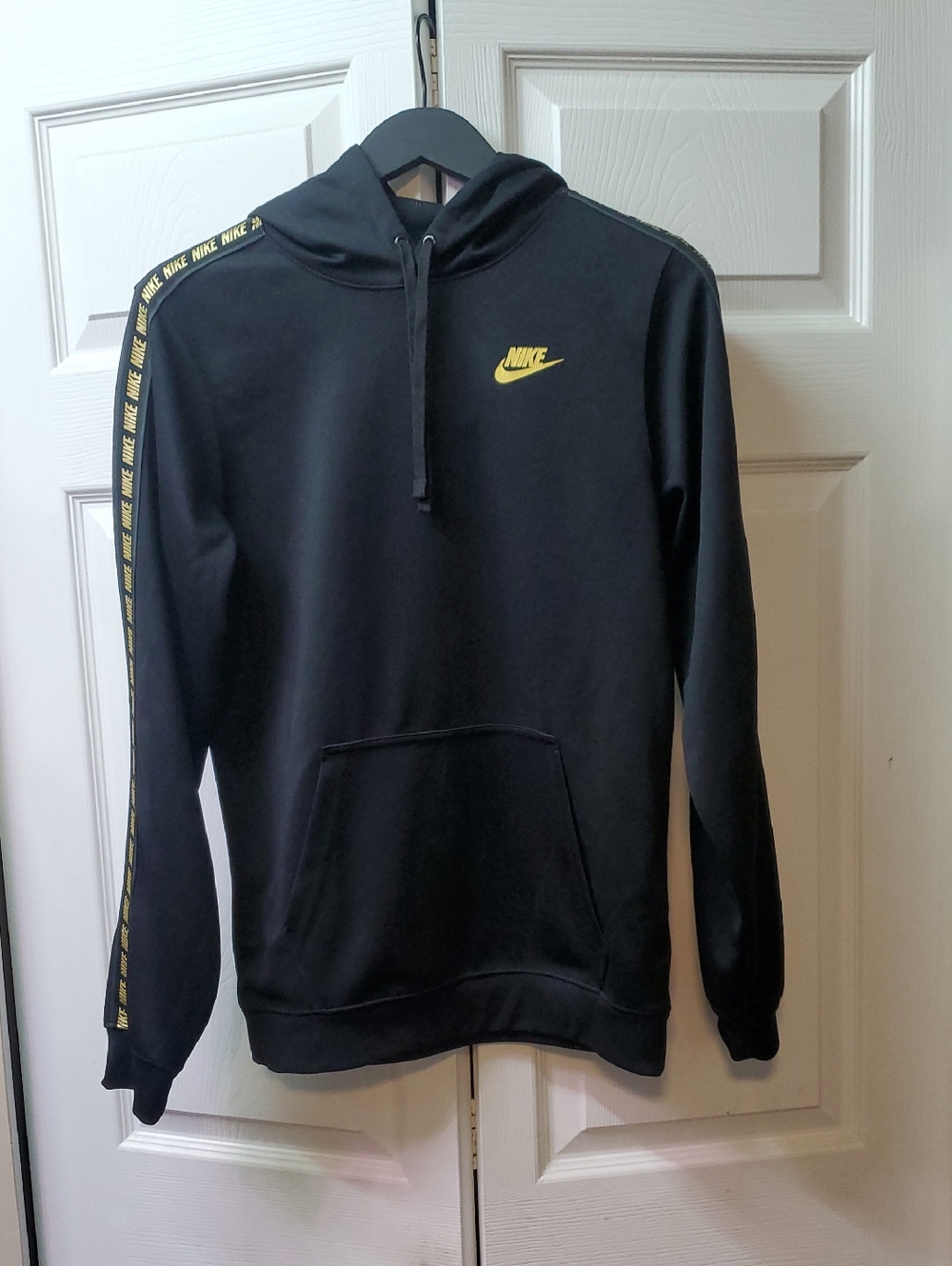 Nike Black Hoodie with Gold Logo and Tape Trim